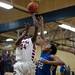 Milan player Nick Perkins shoots in the second half of the game against Gibraltar Carlson on Monday, March 11. Daniel Brenner I AnnArbor.com